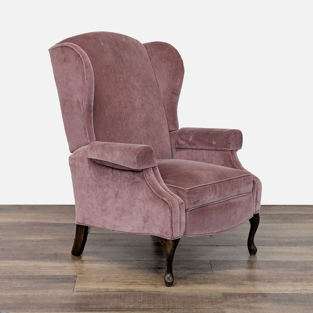 3. Angled view of Reperch classic wingback lounge chair with rolled arms and plush upholstery.