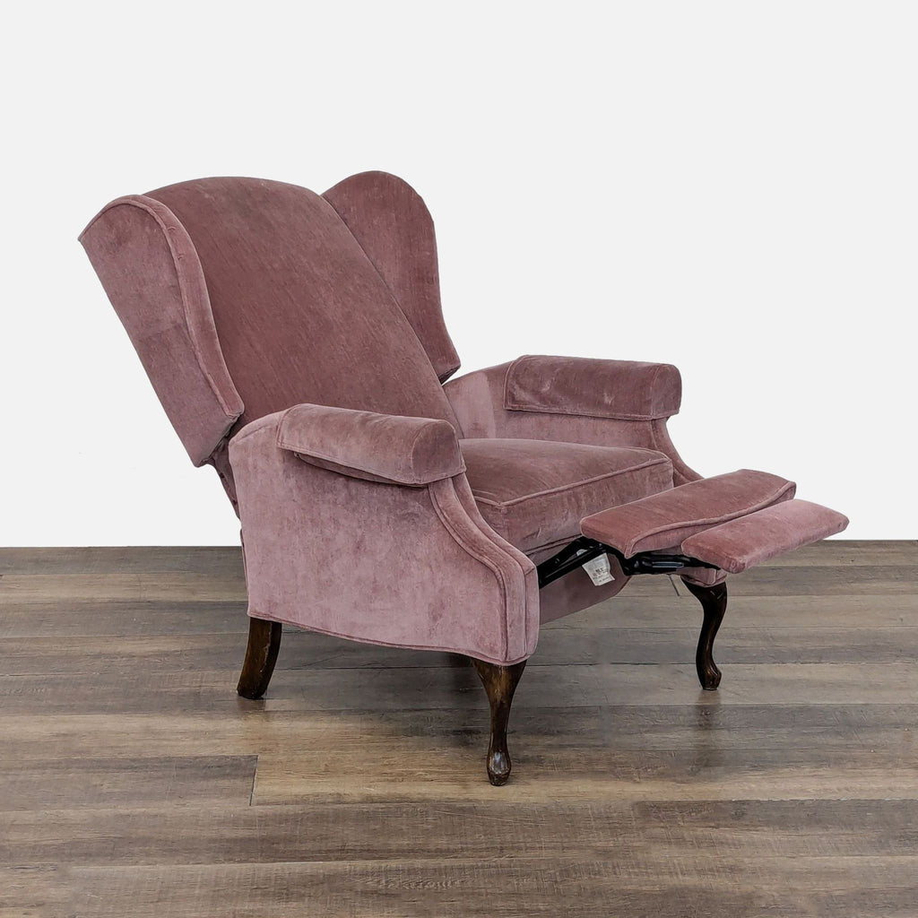 2. Reclined Reperch lounge chair showing push back feature and extended footrest, side angle.