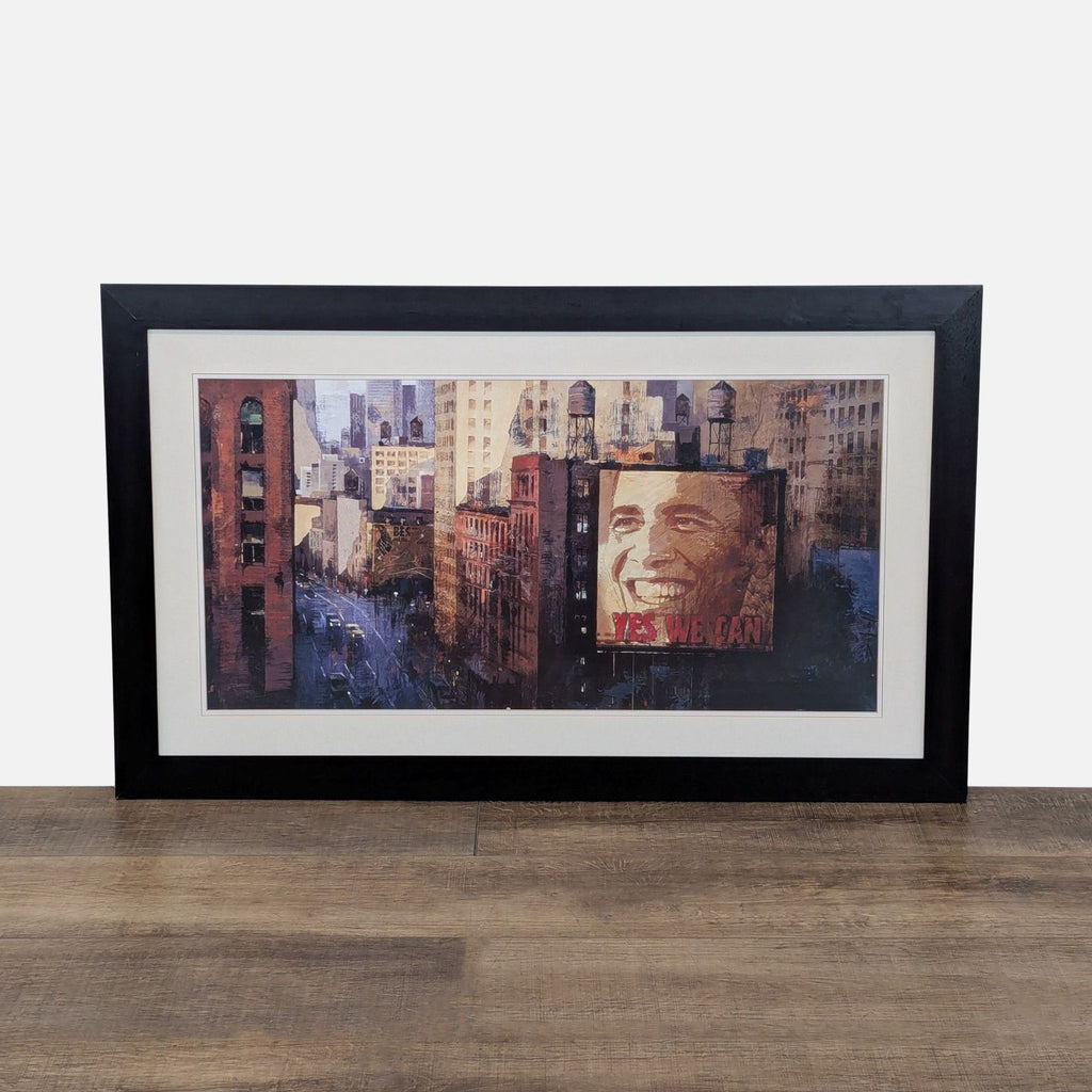 1. Framed cityscape print by Marti Bofarull showing a large "YES WE CAN" billboard in a painted urban setting.