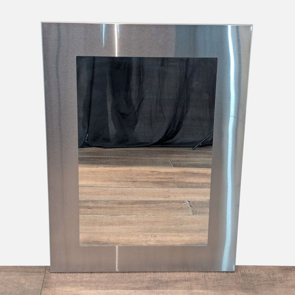 1. Rectangular Room and Board wall mirror with wide brushed metal frame and reflective glass center, category Mirror.