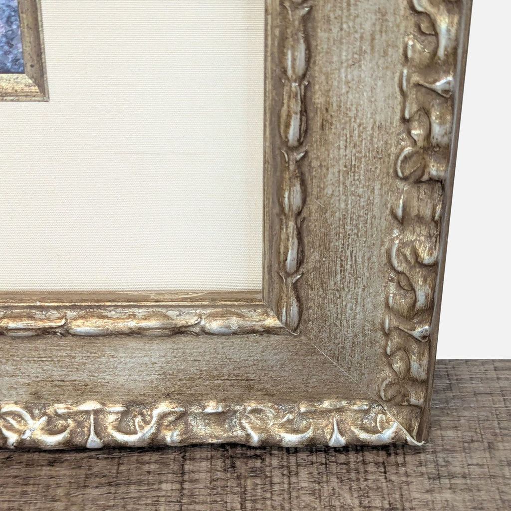 2. Close-up of the decorative gold frame’s detailed texture, highlighting the ornate Reperch design.
