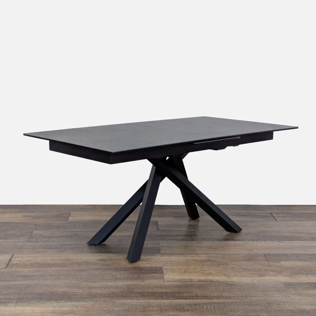 3. Sleek expandable dining table with ceramic top and steel legs, by Kawaguchikagu Rakuten, seats more when extended.