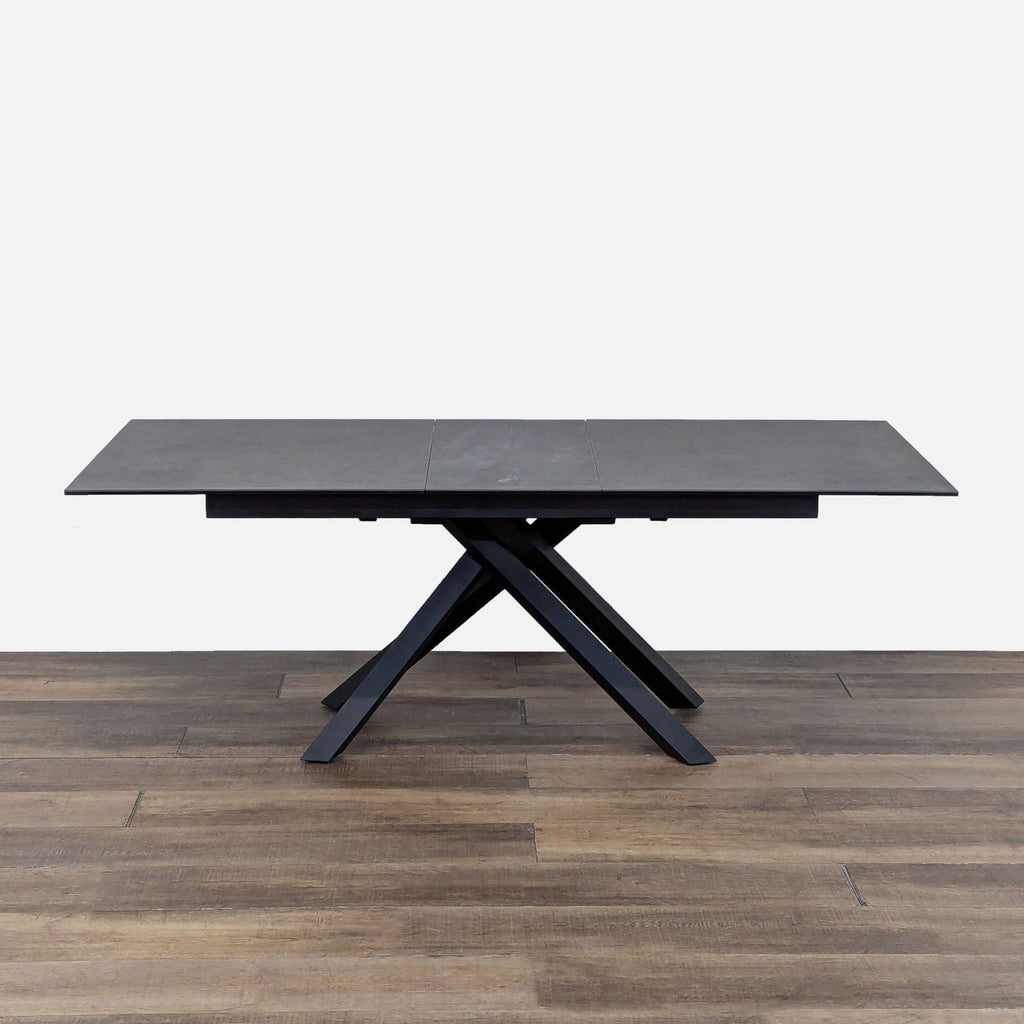 2. Kawaguchikagu Rakuten dining table with ceramic and glass top, black steel base, extends from 63 to 79 inches.