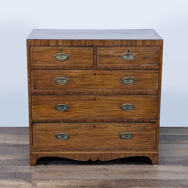 1. Vintage wood dresser by Reperch with brass drop handles and inlay detail, five drawers, front view.  