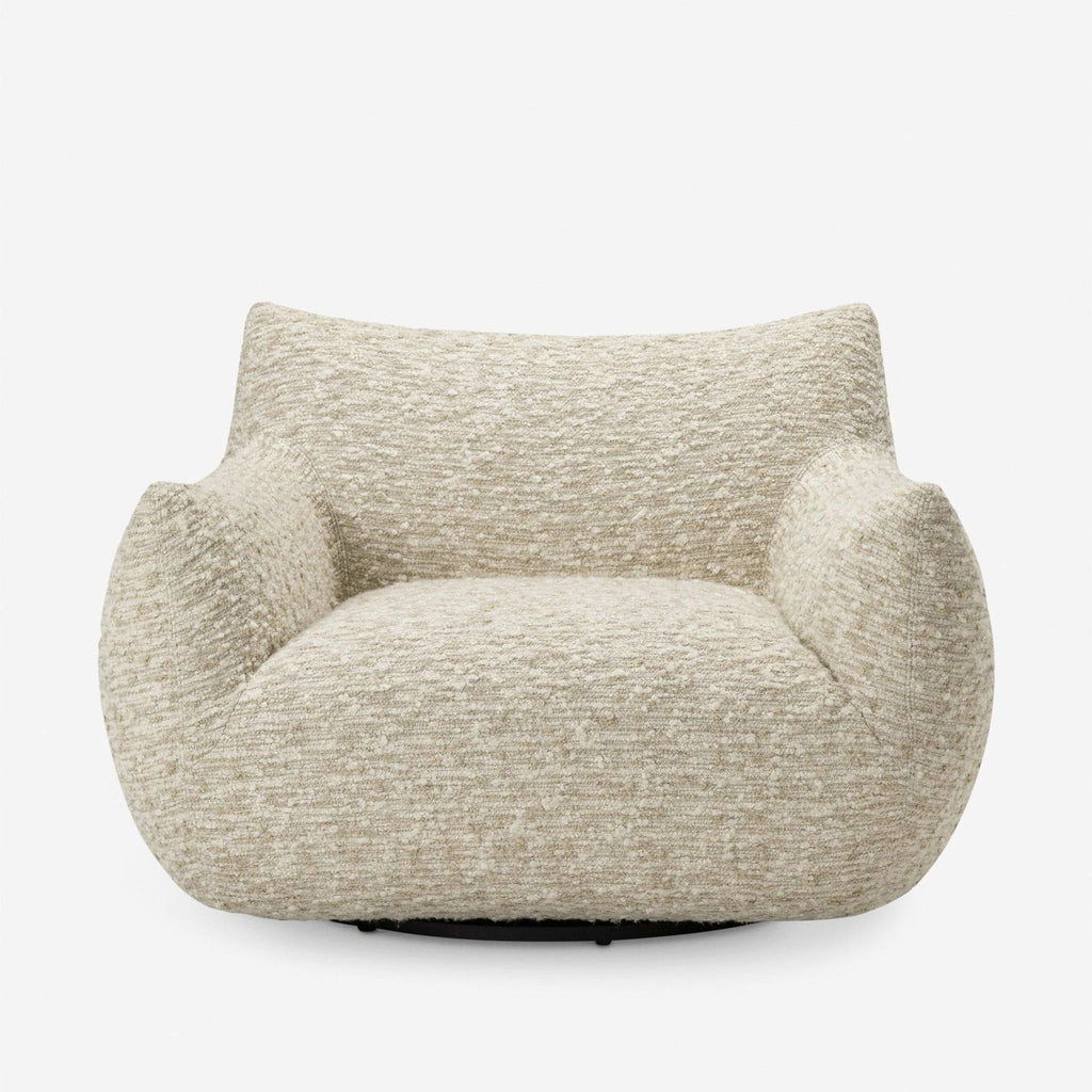 1. Front view of a vintage-inspired lounge chair by Lulu and Georgia, featuring thick boucle upholstery and a swivel base.