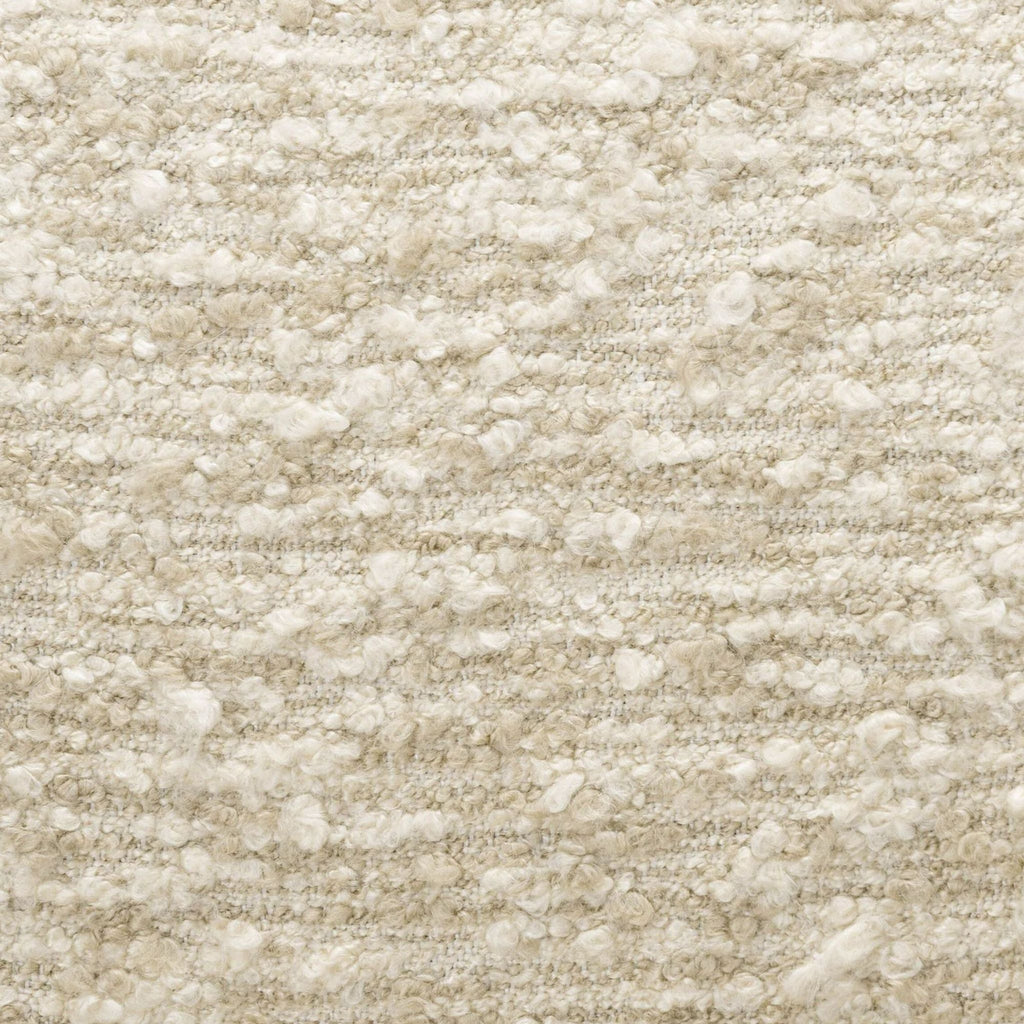 3. Close-up of Lulu and Georgia lounge chair’s thick cream-colored boucle upholstery, highlighting its soft textured weave.
