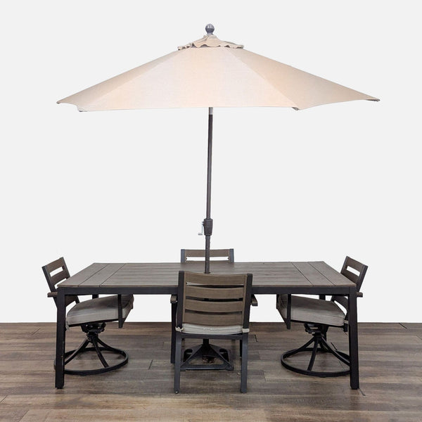 1. Reperch aluminum and wood dining set with two side chairs, two rocker chairs, table and open umbrella.