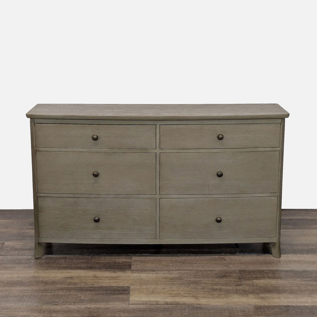 1. Williams-Sonoma dresser with 6 drawers, metal pulls, and a sleek, modern wood finish.  