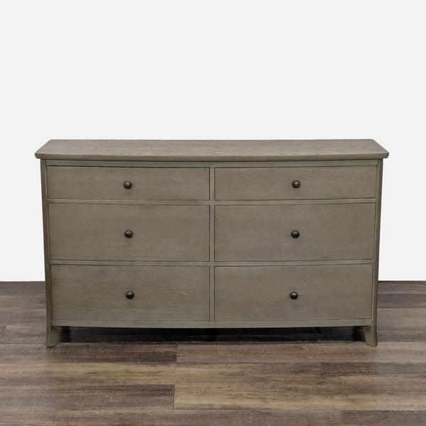 1. Williams-Sonoma dresser with 6 drawers, metal pulls, and a sleek, modern wood finish.  