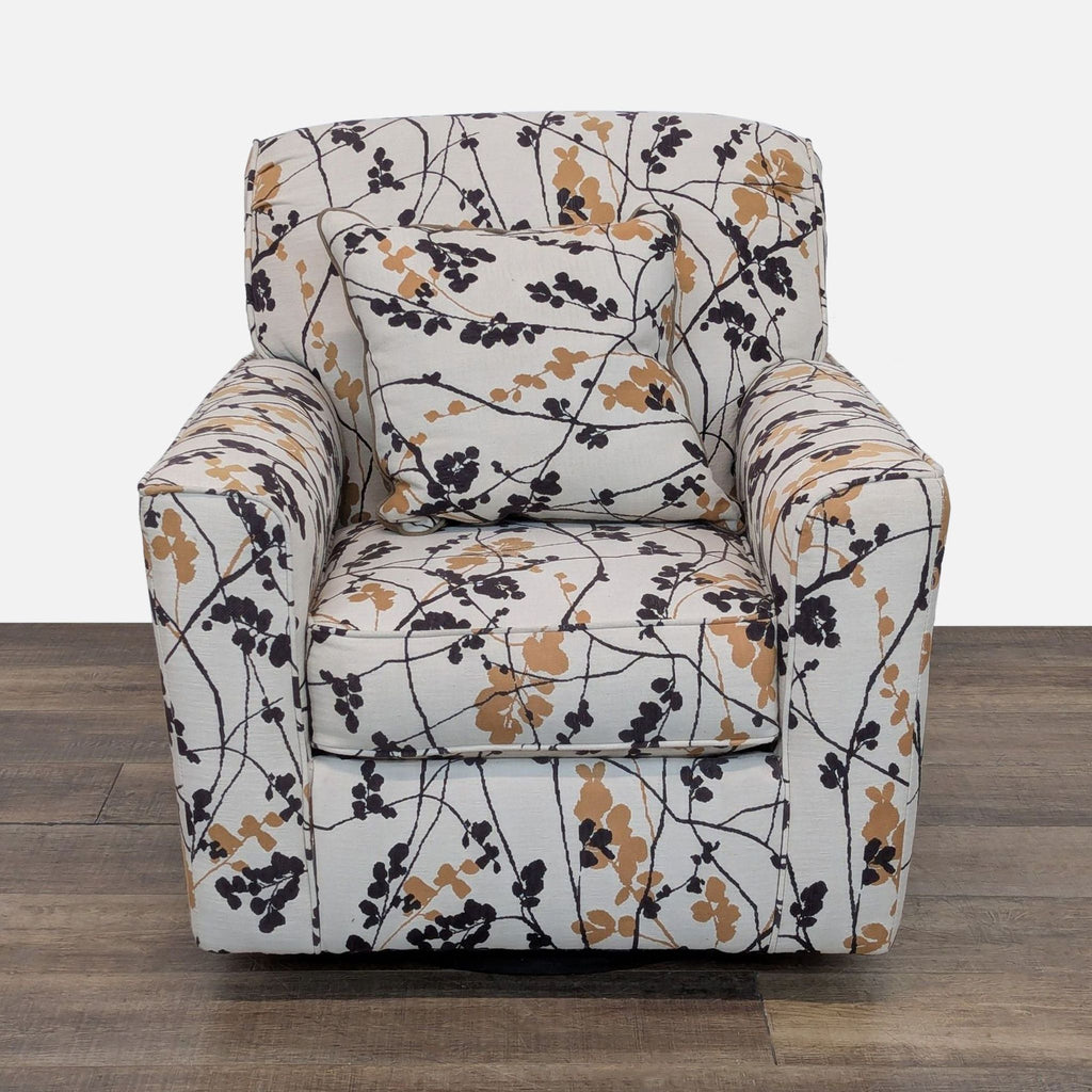 1. Ashley Furniture lounge chair with 360-degree swivel and floral print, front view, includes matching pillow.