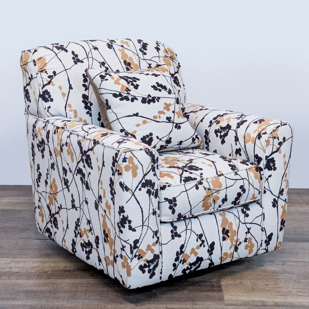 2. Side angled view of a floral-patterned, swivel lounge chair by Ashley Furniture, includes matching cushion.