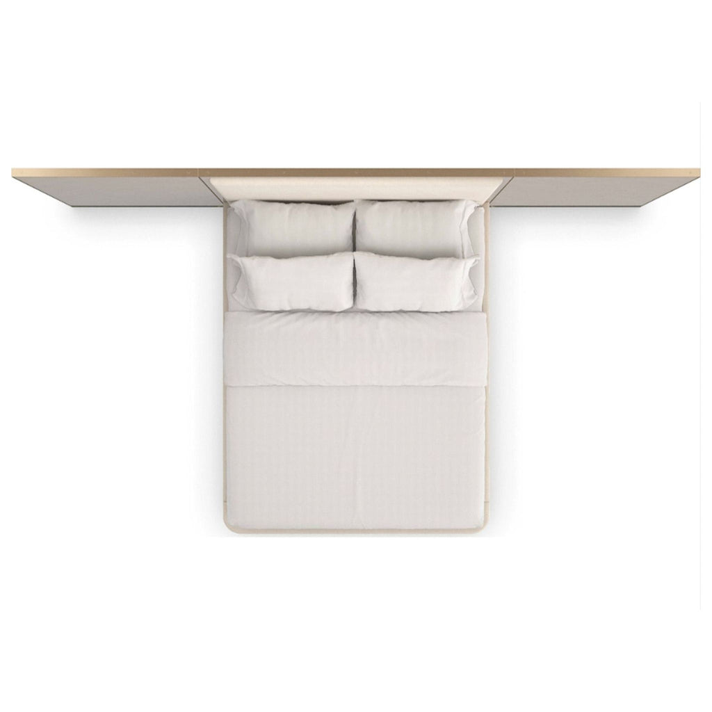 3. Top view of a Caracole frame bed with patterned veneer wings, plush flannel headboard, and metallic detailing.