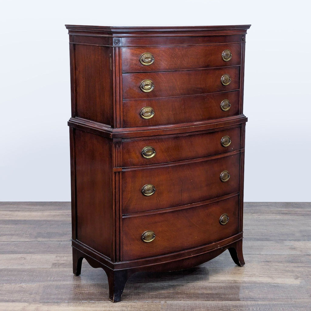 3. Classic Drexel mahogany dresser with curved front, dovetail joinery and brass hardware, shown from an angle.