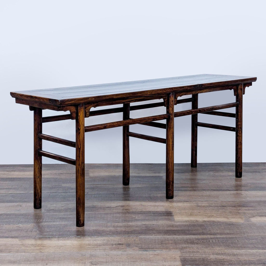 2. Reperch brand console table, crafted from elmwood, displays elegant hand-carved details and sturdy legs.