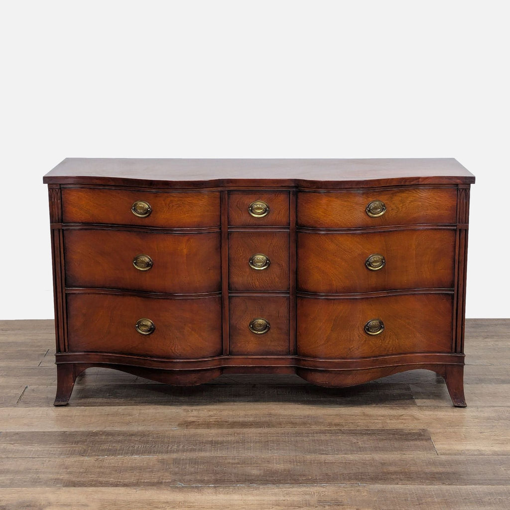 1. Drexel solid wood dresser with high-quality veneer, 9 dovetail drawers, and brass pulls on a wood floor.