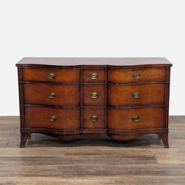 1. Drexel solid wood dresser with high-quality veneer, 9 dovetail drawers, and brass pulls on a wood floor.