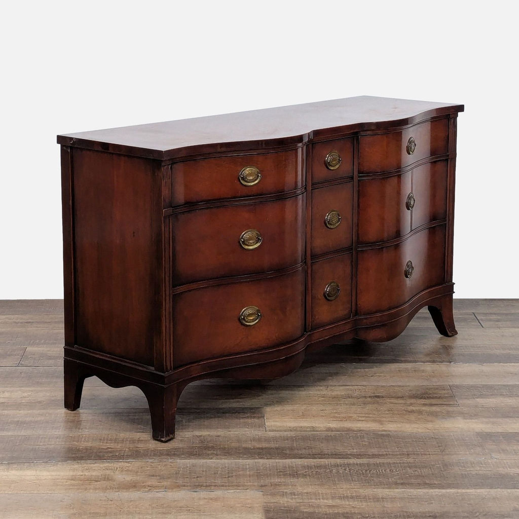 3. Angled view of Drexel wooden dresser featuring 9 drawers, elegant veneer, and classic brass pulls.