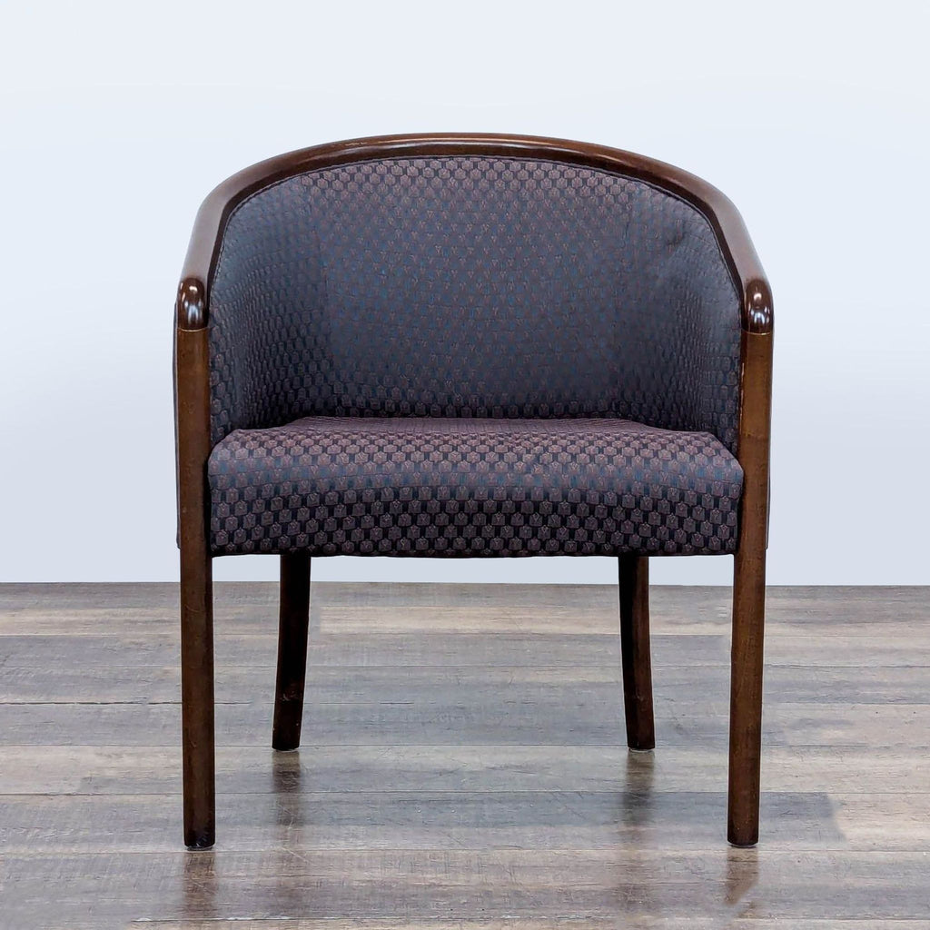 1. Barrel-style Kimball lounge chair with dark wood frame, curved backrest, and patterned upholstered seat.
