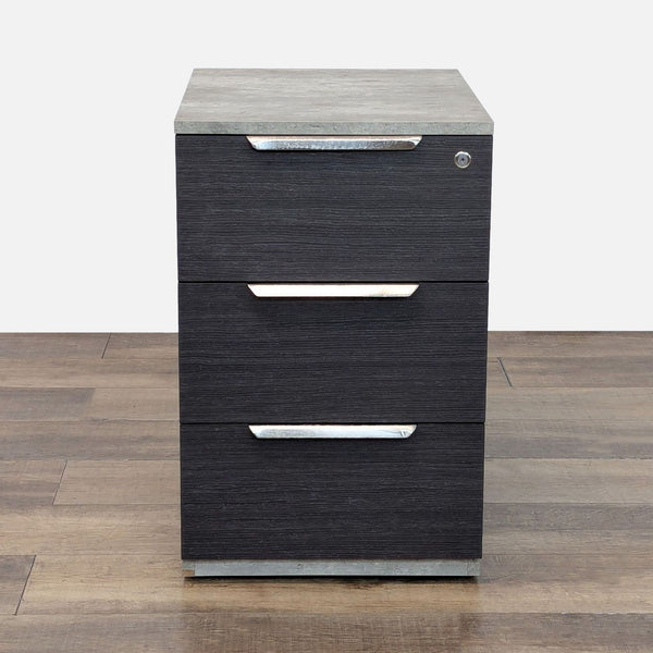 1. Modern dark wood cabinet with three drawers and a lock, by Scandinavian Designs, shown on a wood floor.
