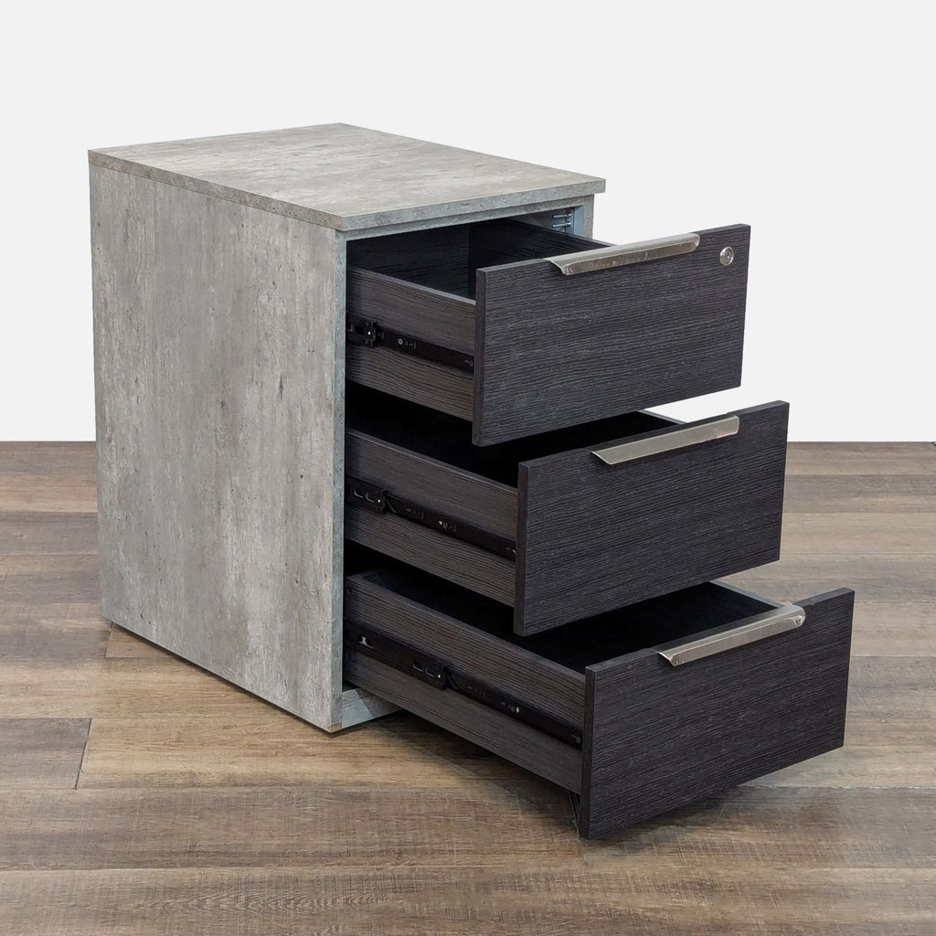 2. Side view of a Scandinavian Designs cabinet with all three drawers open, featuring a lock and sleek handles.