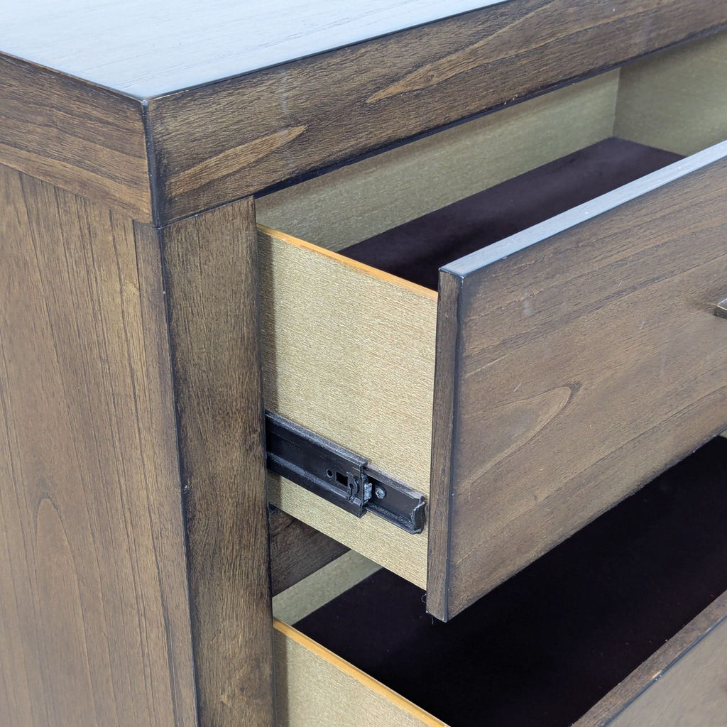 3. Close-up of Aspenhome dresser drawer, highlighting the dark wood finish and bronze drawer pull.