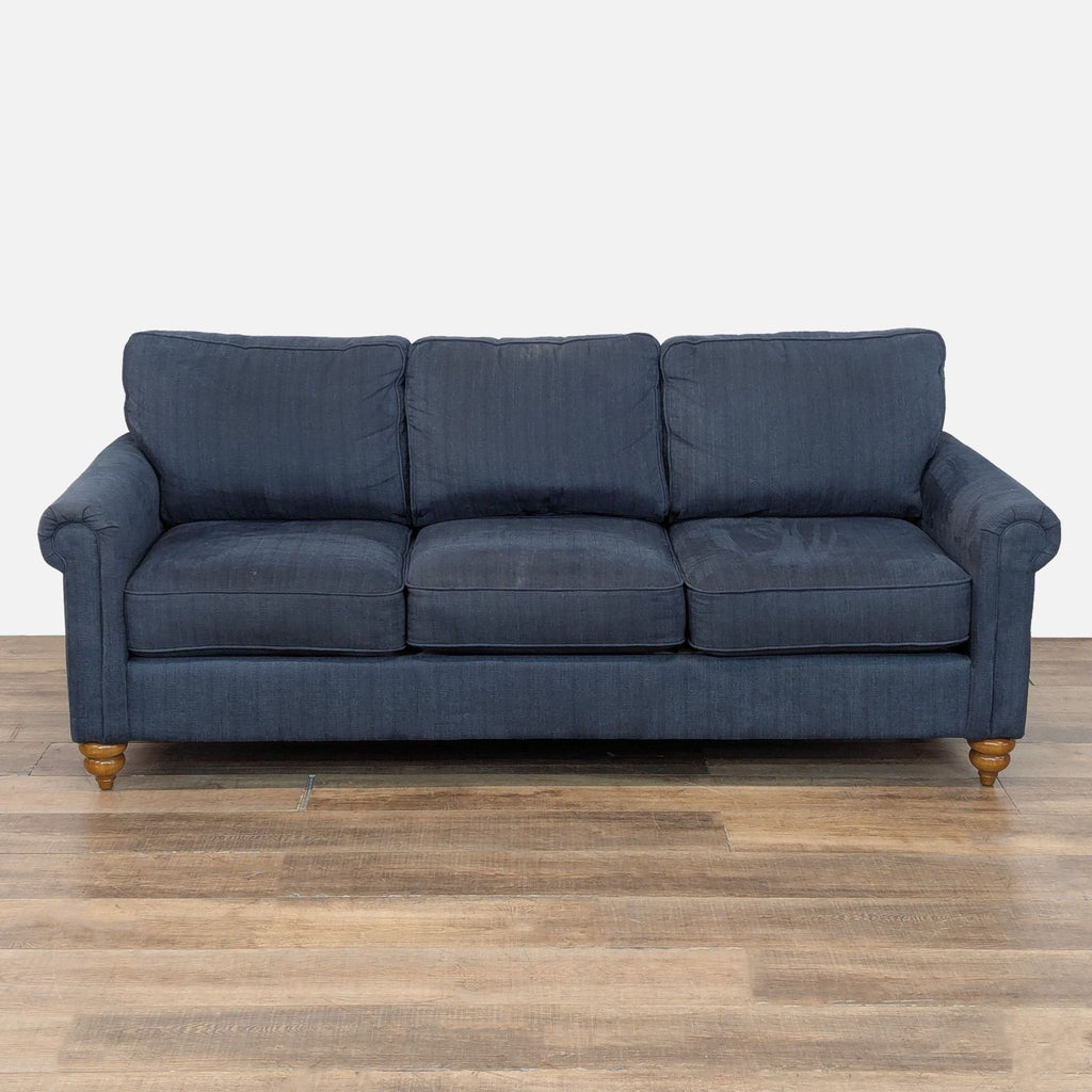 1. La-Z-Boy 3-seat sofa with blue fabric upholstery, rolled arms, and turned wood feet, front view.  
