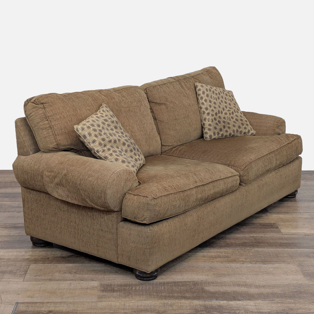 3. Angled view of Ethan Allen 3-seat sofa, featuring plush cushions, textured upholstery, and removable arm covers.