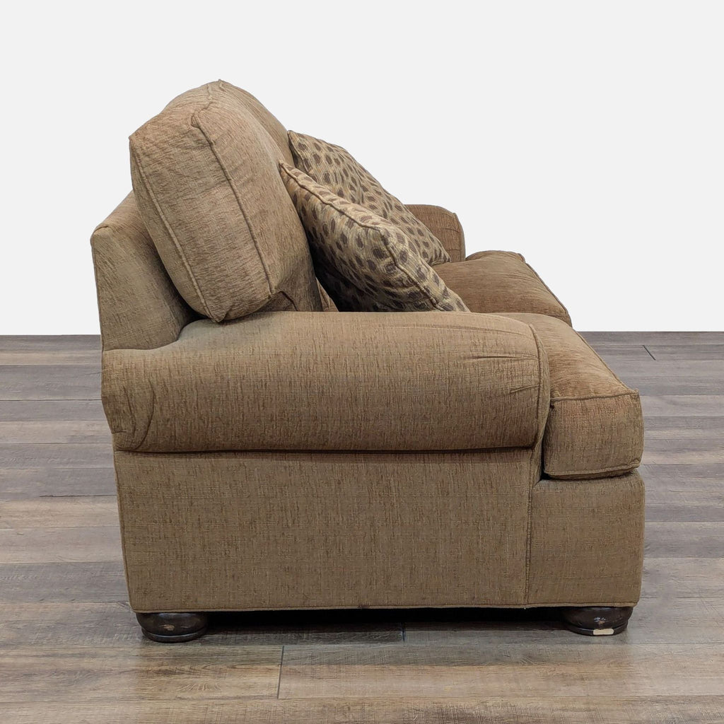 2. Side profile of Ethan Allen loveseat showing plush cushions, removable arm covers, and wood feet.
