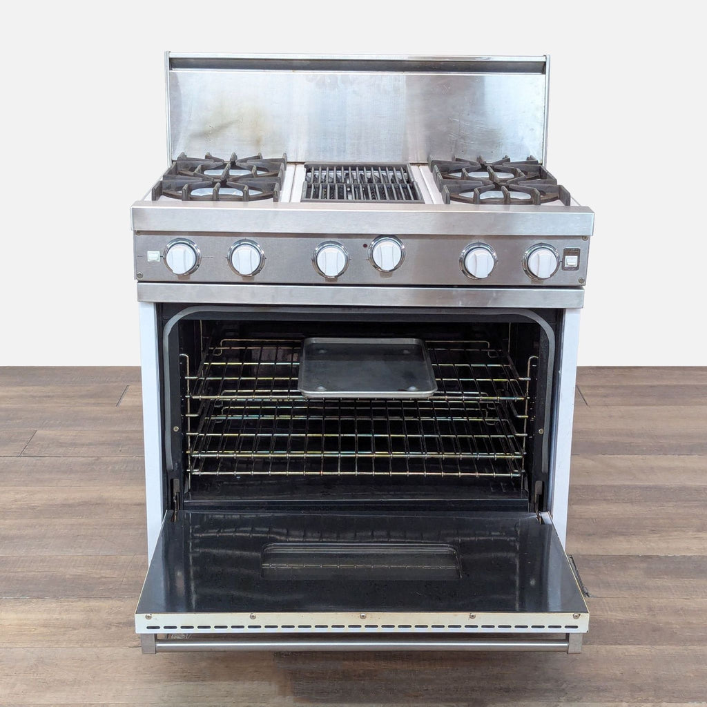 The Viking 36-inch range is shown with the oven door open, displaying multiple racks and a baking tray inside.