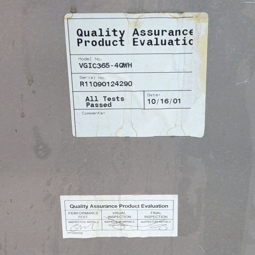 Close-up of a quality assurance label on the Viking VGIC365-4QWH, confirming model, serial number, and inspection date.