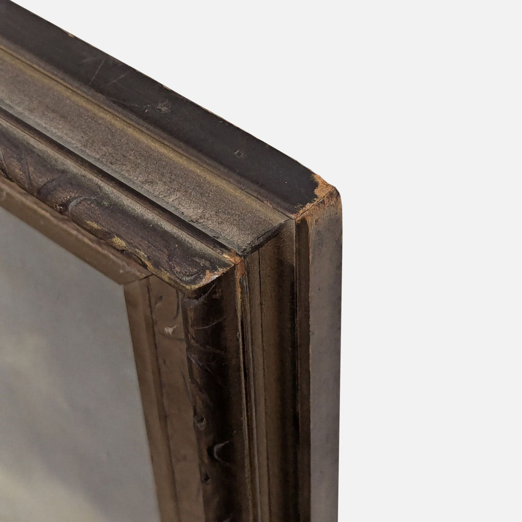 3. Detail view of ornate gold frame corner, displaying visible wear and some rubbing on the wood.
