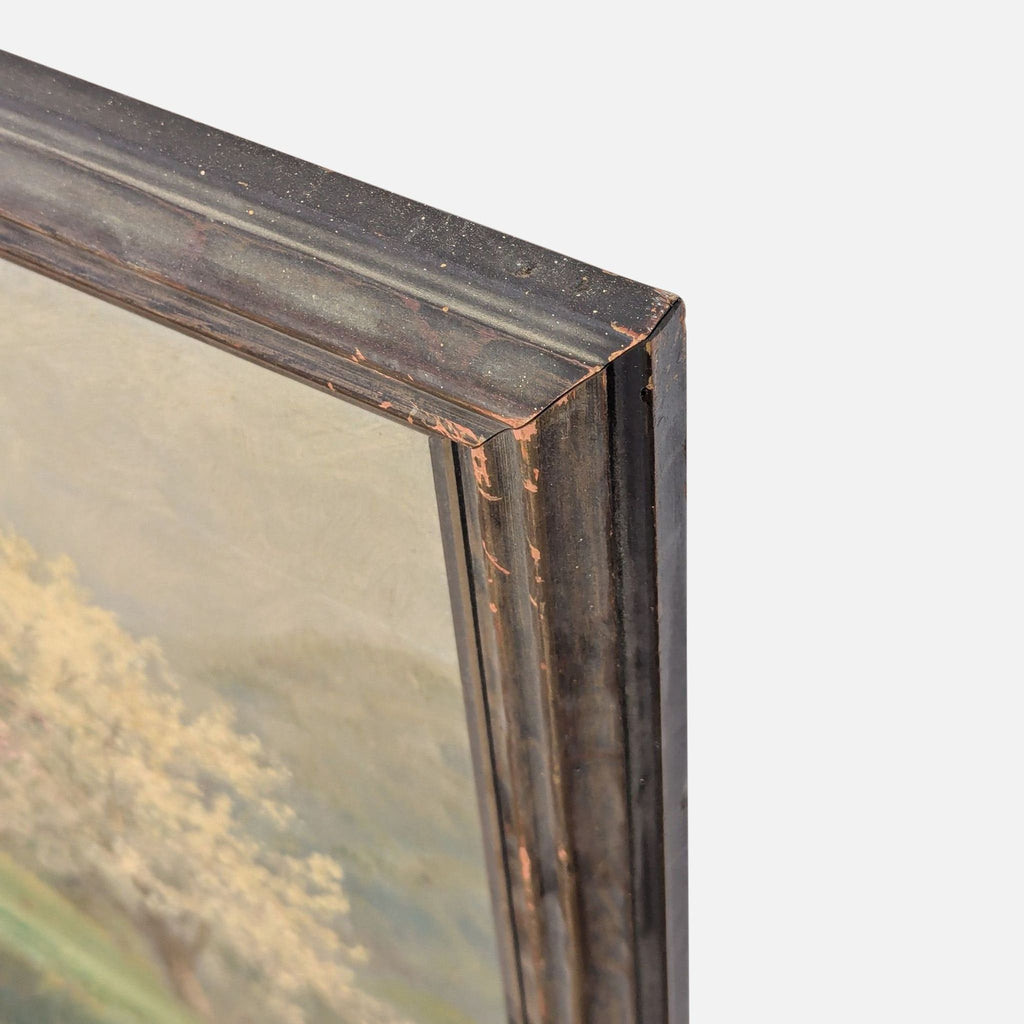 3. Detailed view of the painting’s worn wooden frame corner, showing texture and craftsmanship.