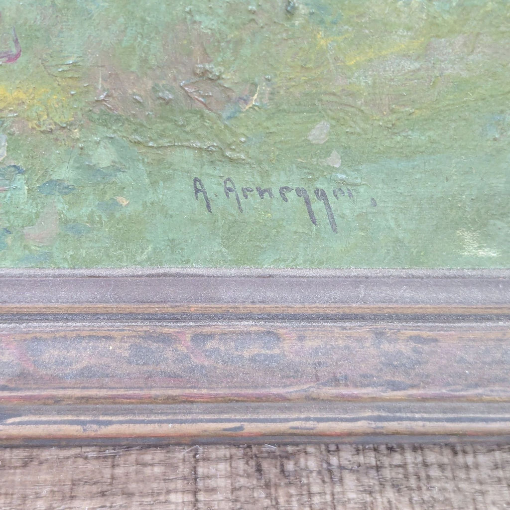 2. Close-up of Alois Arnegger's signature on a painted green background of the artwork.  