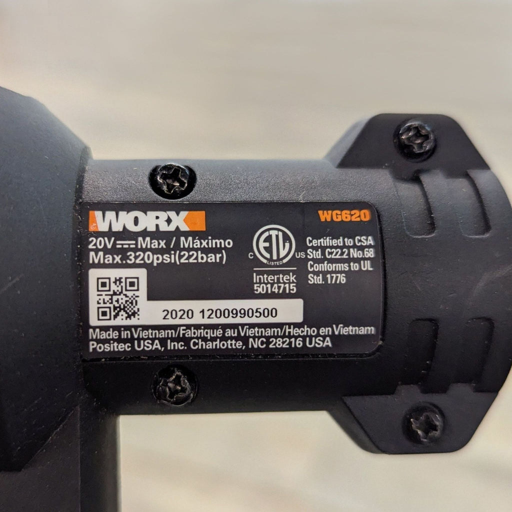 Close-up of the Worx WG620 label, displaying 20V, 320psi max pressure, certifications, and manufacturer details.