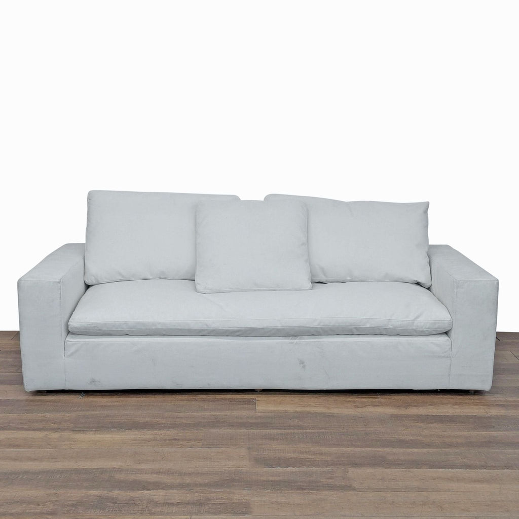 Restoration Hardware Cloud 3-seat sofa with plush cushions, wide arms, and soft white upholstery, front view.  