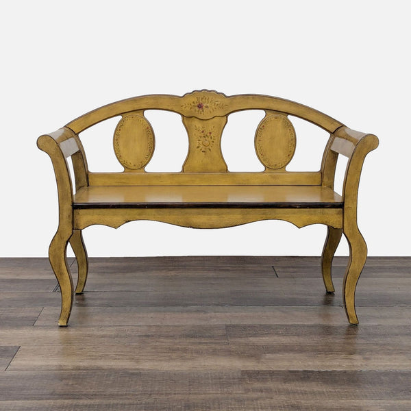 1. Yellow wooden bench with carved floral details and an arched back, by Pulaski Furniture, on wood floor.
