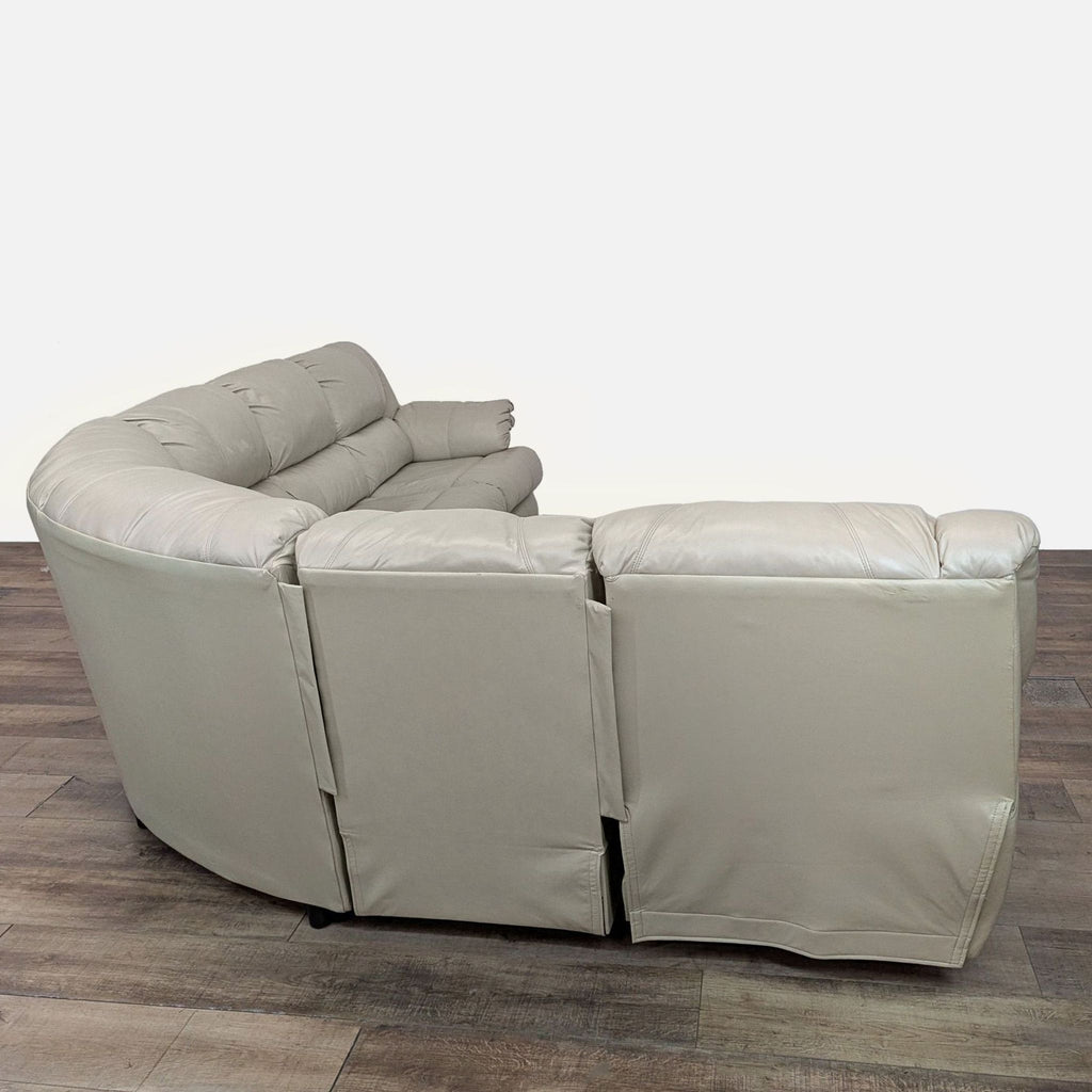 Ashley Furniture Leather Sectional with Recliner and Sleeper