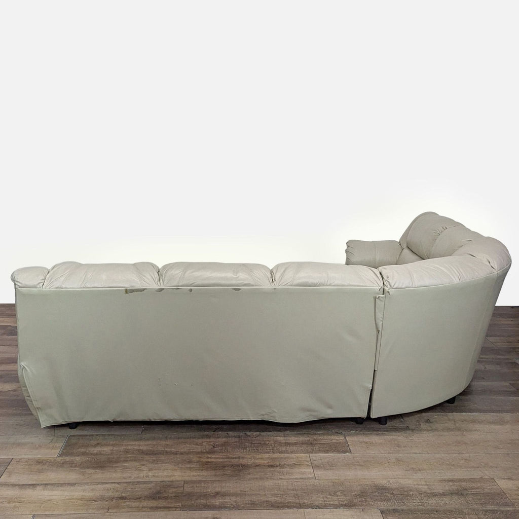 Ashley Furniture Leather Sectional with Recliner and Sleeper