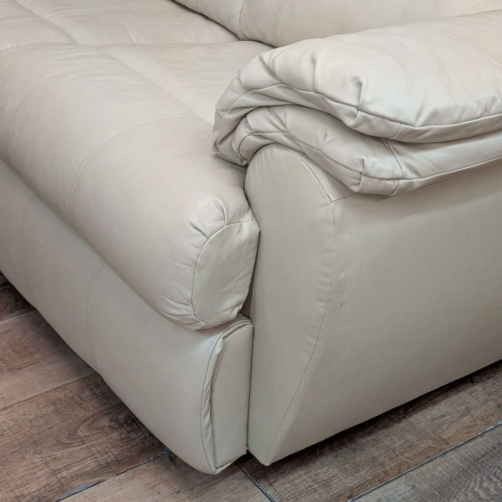 Ashley Furniture Leather Sectional with Recliner and Sleeper