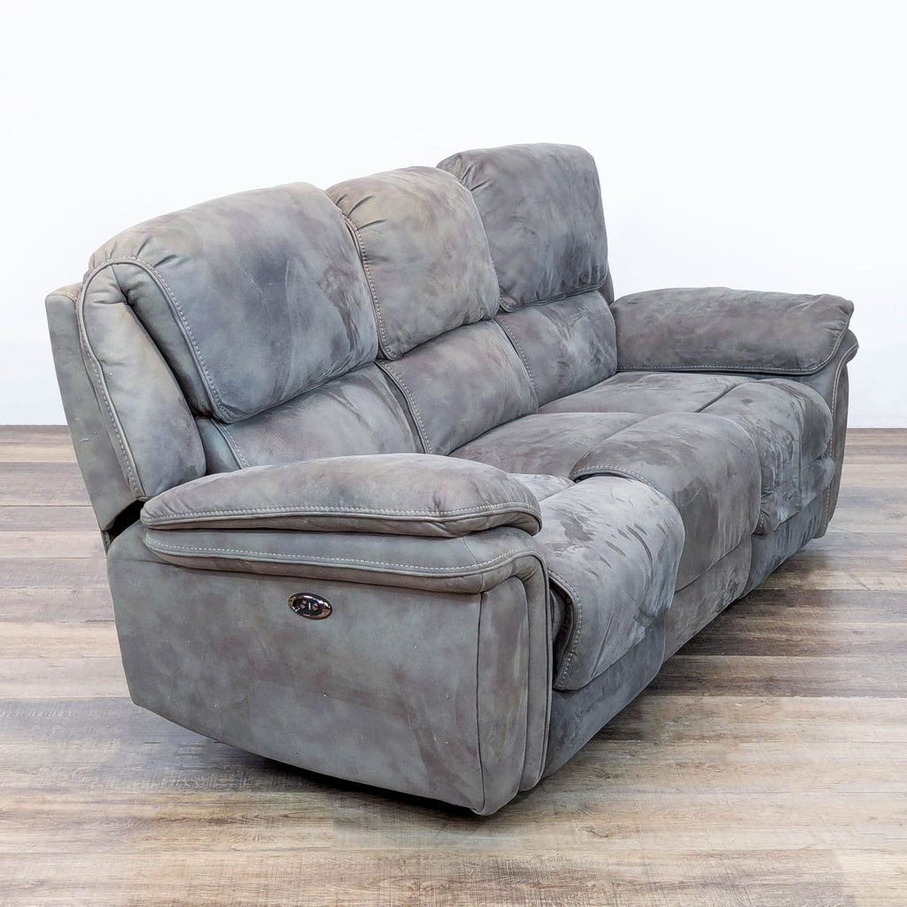 3. Angled view of a Reperch 3-seat sofa featuring power recliners and USB charging ports, in gray upholstery.