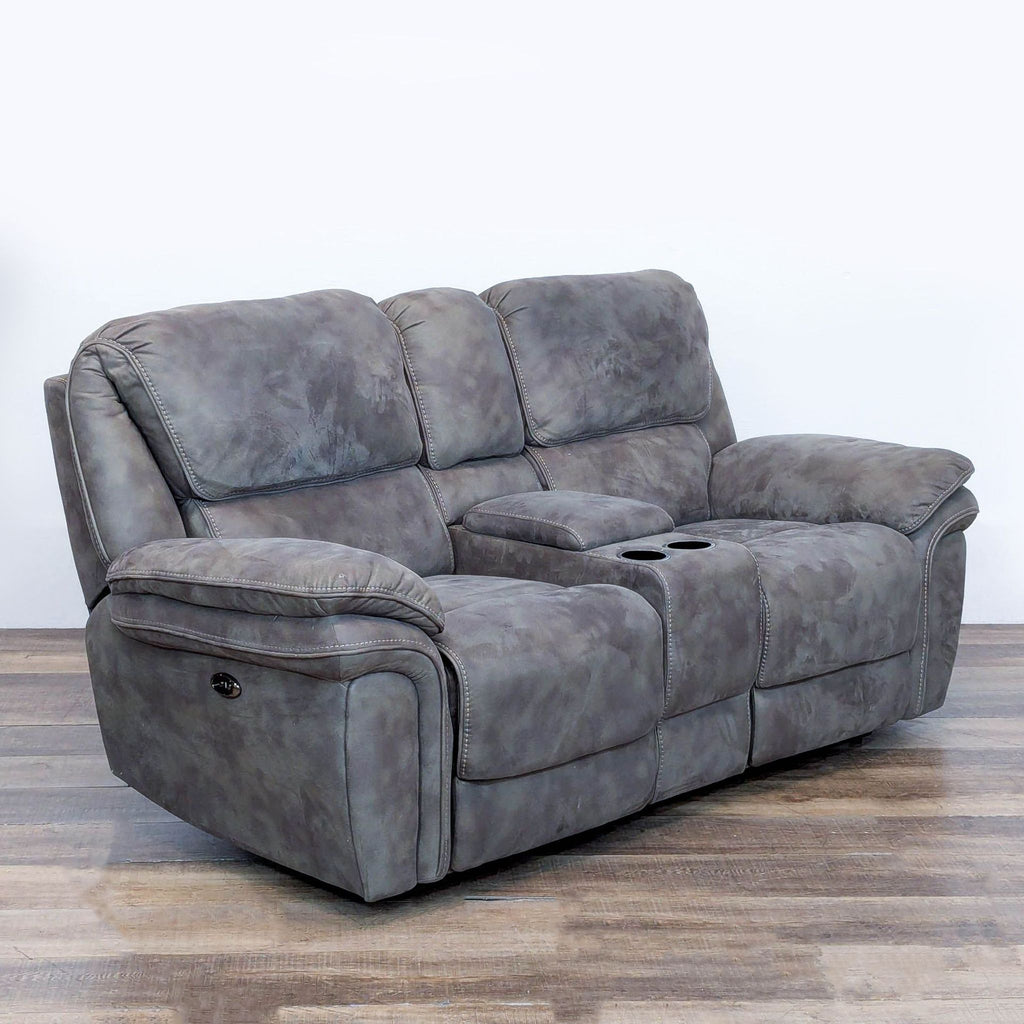 3. Angled view of gray Reperch loveseat featuring power recliners, USB charging, and center console with cup holders.