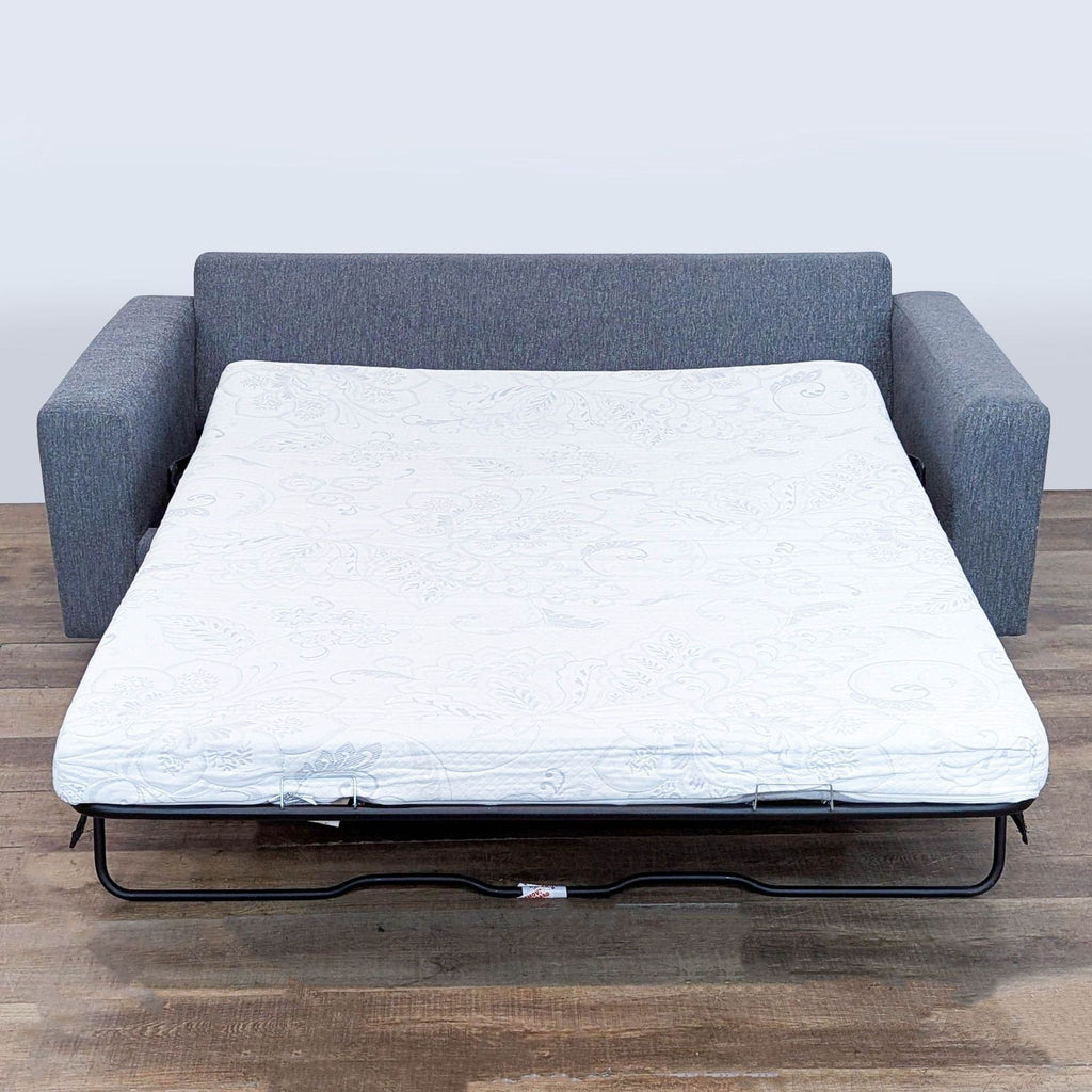 2. West Elm sleeper sofa extended with pull out memory gel mattress fully exposed for sleeping.  