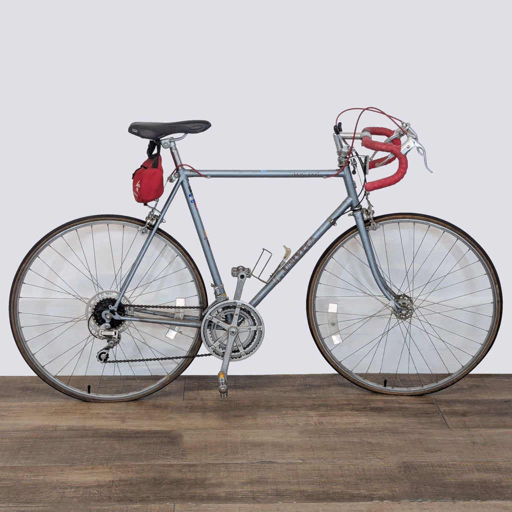 Vintage Univega road bike with steel frame and drop handlebars, ideal for long road rides and racing feel.  