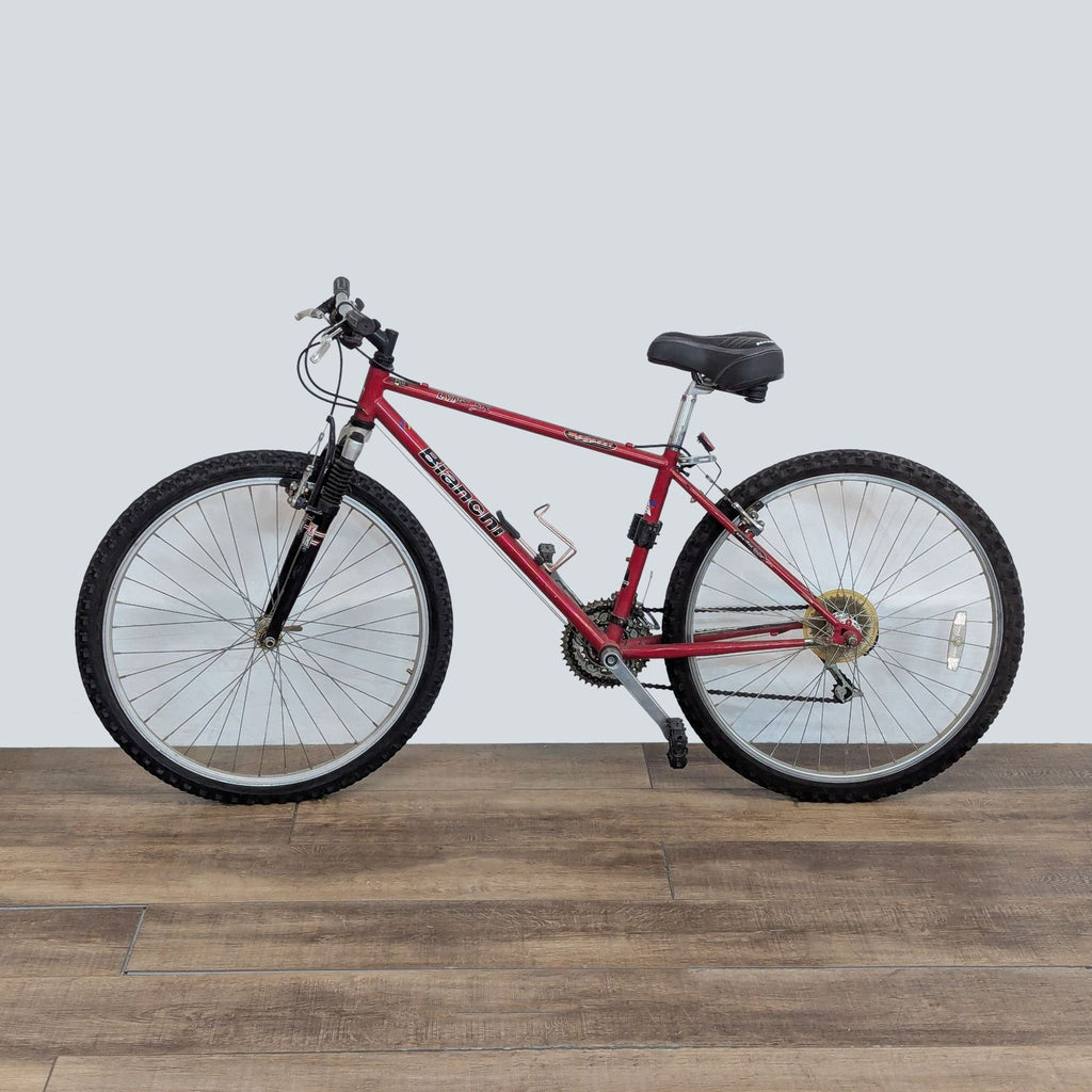 Side view of a red Schwinn mountain bike, showing its durable build and comfortable design, perfect for all riders.  