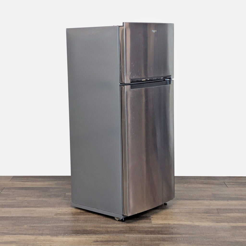 2. Angled view of Whirlpool stainless steel refrigerator, highlighting adjustable shelving and contemporary finish.