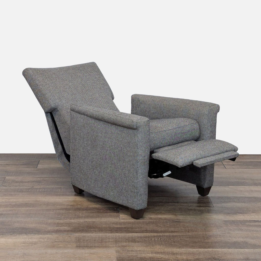 2. Lounge recliner by Crate & Barrel shown reclined, displaying footrest and high back design.  