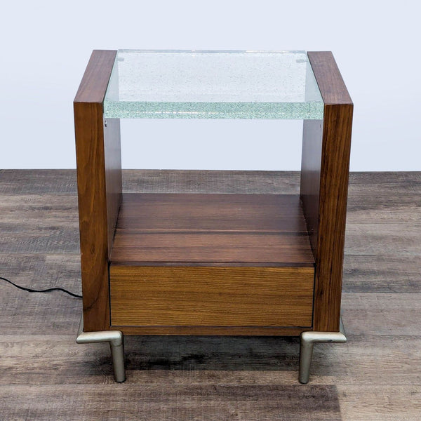 1. Caracole end table made of dark wood with a single drawer and a clear, bubble-accented light-up acrylic top.