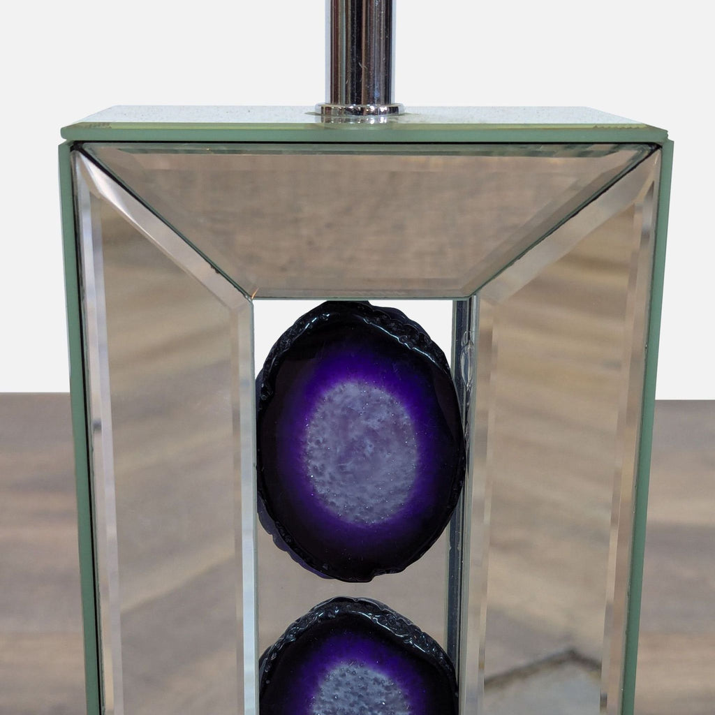 2. Close-up of mirrored lamp base showing purple amethyst slabs set in a beveled frame, from Reperch.