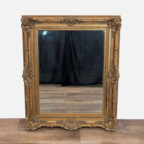 1. Ornate Reperch mirror with intricate gold frame, featuring detailed baroque-inspired carvings and vintage finish.
