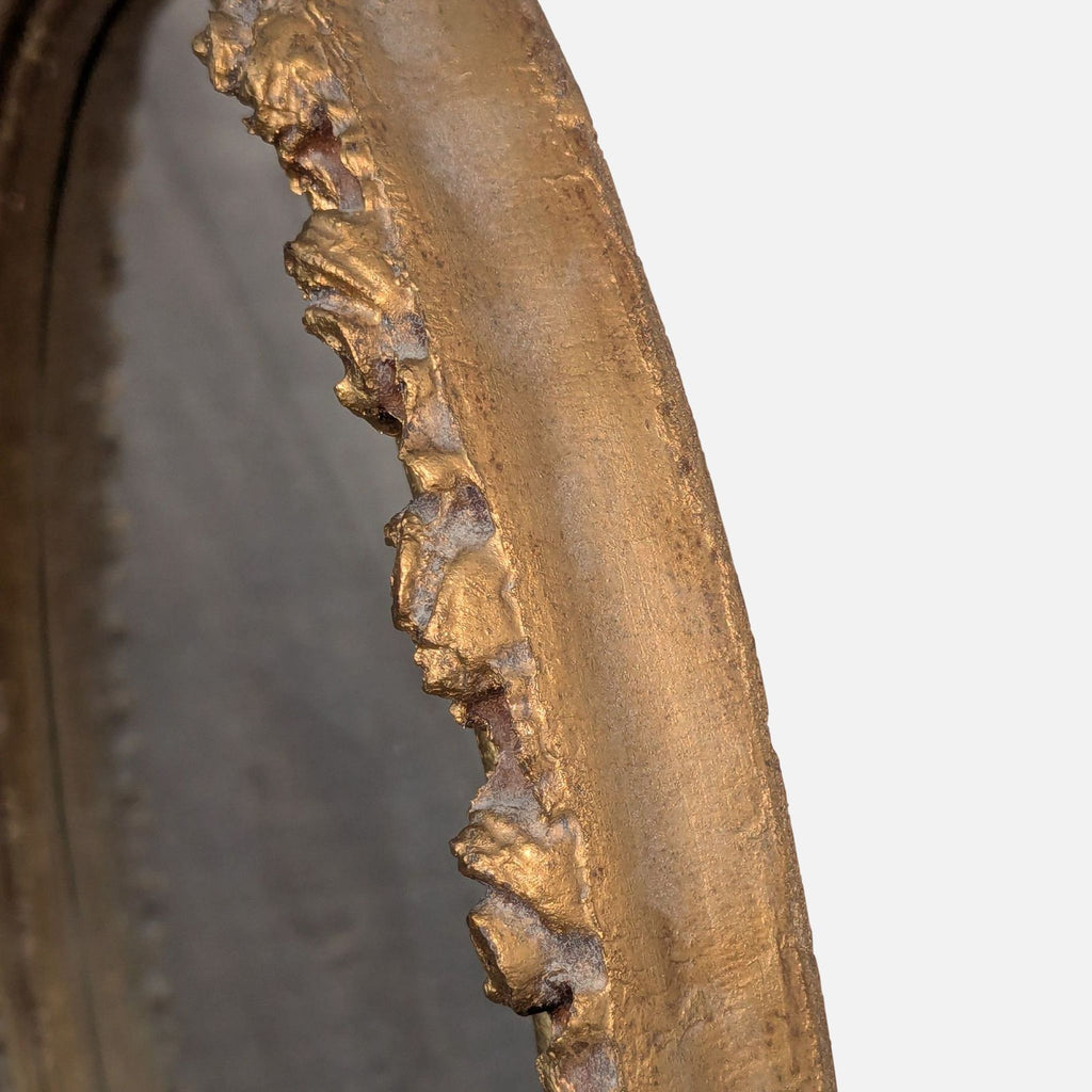 3. Detailed view of the rugged, gold-finished edge on the Art Light Company mirror’s ornate frame.